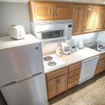Photo of Kitchen with refrigerator, microwave, stove, dishwasher, sink and cabinets