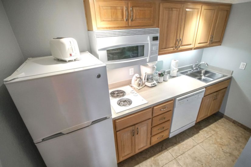 Photo of Kitchen with refrigerator, microwave, stove, dishwasher, sink and cabinets