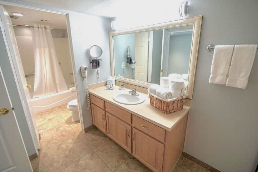 Photo of Bathroom with a door to a separate shower